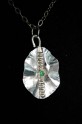 Sterling Silver Pendant with Inlaid Green CZ Stone